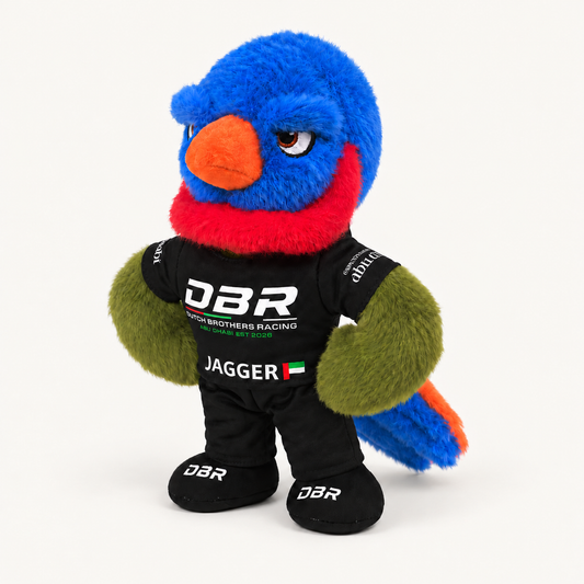 Jagger, the Dutch Brothers Racing mascot, a blue and red plush parrot in a black DBR race suit with the UAE flag on the chest, shown at a three-quarter angle.