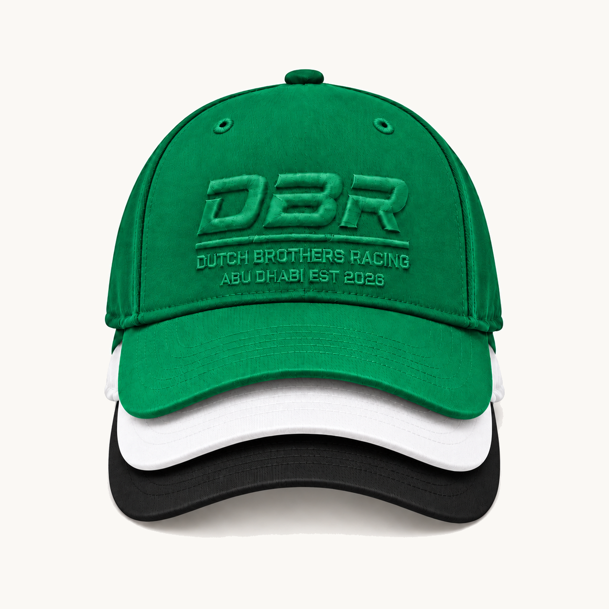 The three Dutch Brothers Racing Founders Caps stacked together, green in front with tonal DBR embroidery, then white and black, sold as the Hat Trick set.