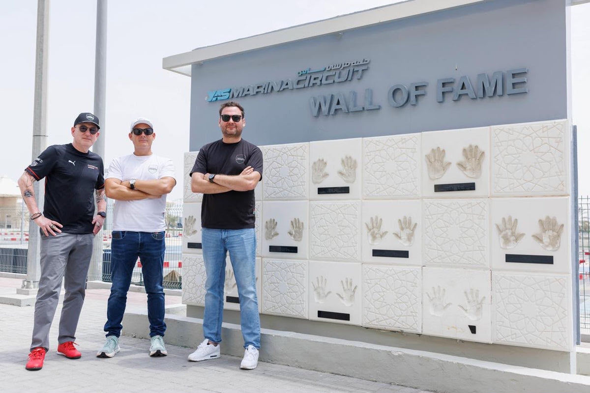 Alan VanderMolen, Jon De Jager and Andy Boux at the Yas Marina Circuit Wall of Fame in Abu Dhabi.